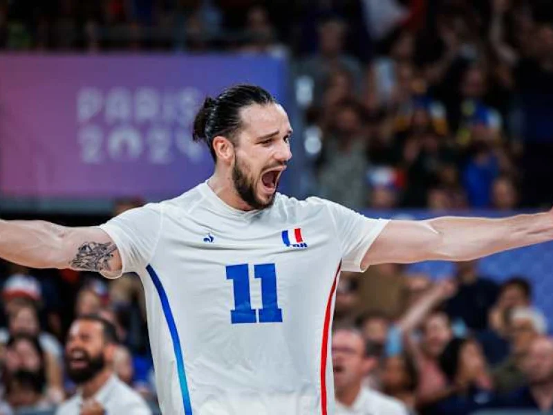 Antoine Brizard celebrates for France during the Paris 2024 Olympic volleyball tournament.