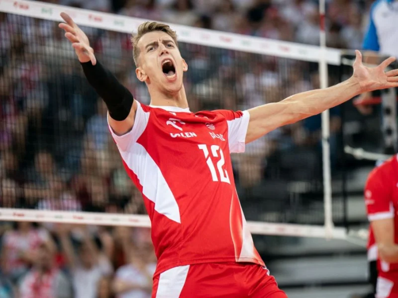 Artur Szalpuk celebrating for Poland during international competition.