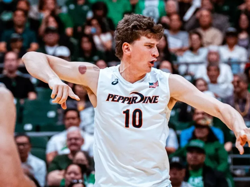 Cole Hartke in match action for Pepperdine men's volleyball.