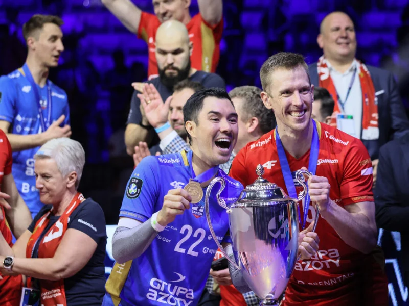 Erik Shoji celebrating with the Champions League trophy during his ZAKSA career.