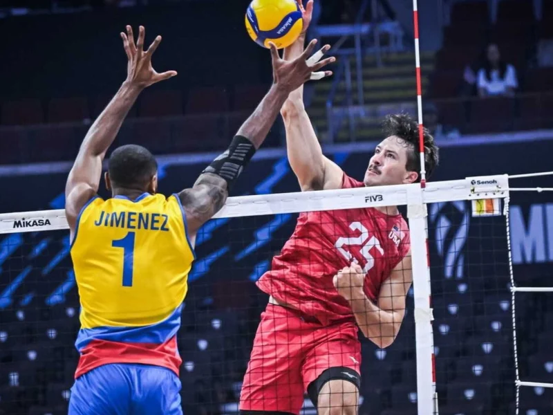 Ethan Champlin attacking for the United States men's national volleyball team.