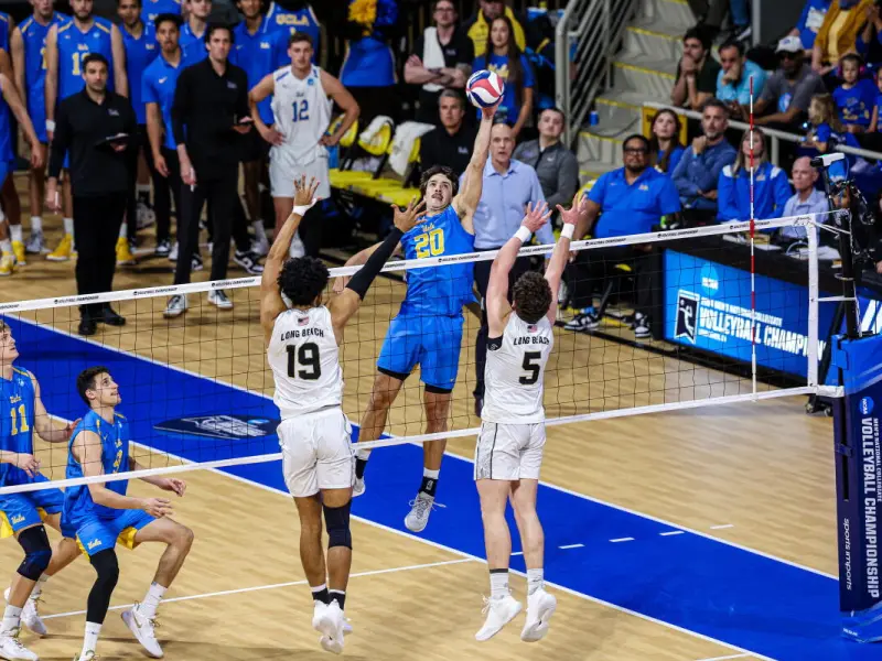 Ethan Champlin attacking for UCLA during the NCAA men's volleyball championship.