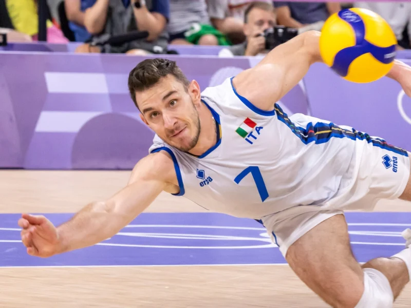 Fabio Balaso diving for a ball for Italy at the Paris 2024 Olympics.