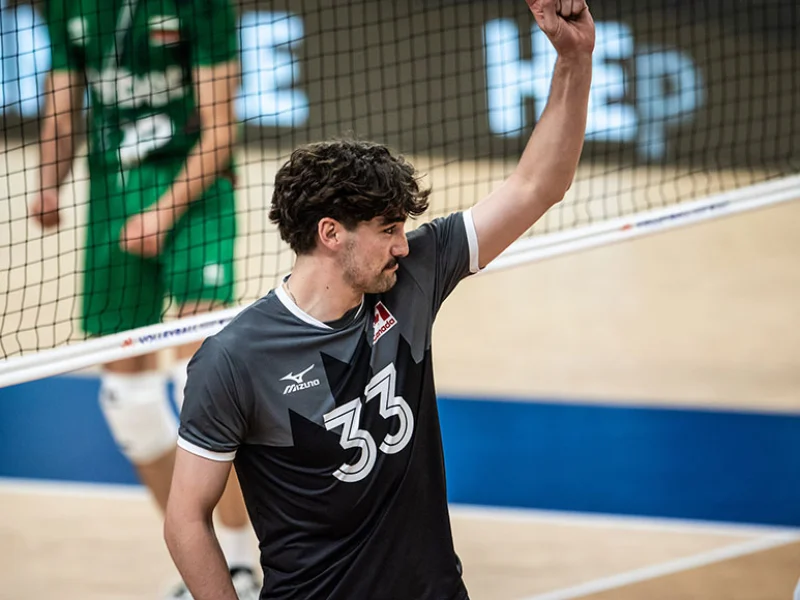 Fynn McCarthy at the net for Canada in Volleyball Nations League competition