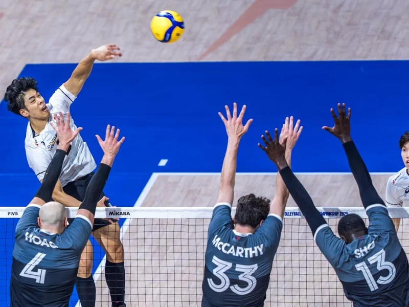 Fynn McCarthy blocking for Canada at the Volleyball World Championship