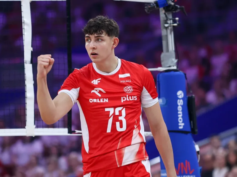 Jakub Nowak celebrates a point with Poland during international volleyball.