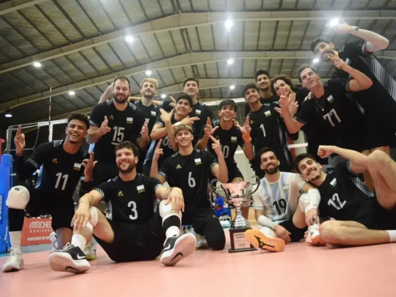 Jan Martínez Franchi, wearing number 3, sits with Argentina teammates after an international volleyball match.