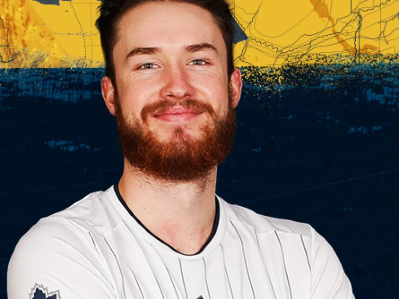 Jesse Elser in a volleyball career portrait.