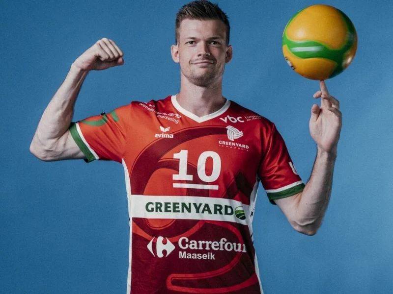 Jolan Cox posing in Greenyard Maaseik kit.