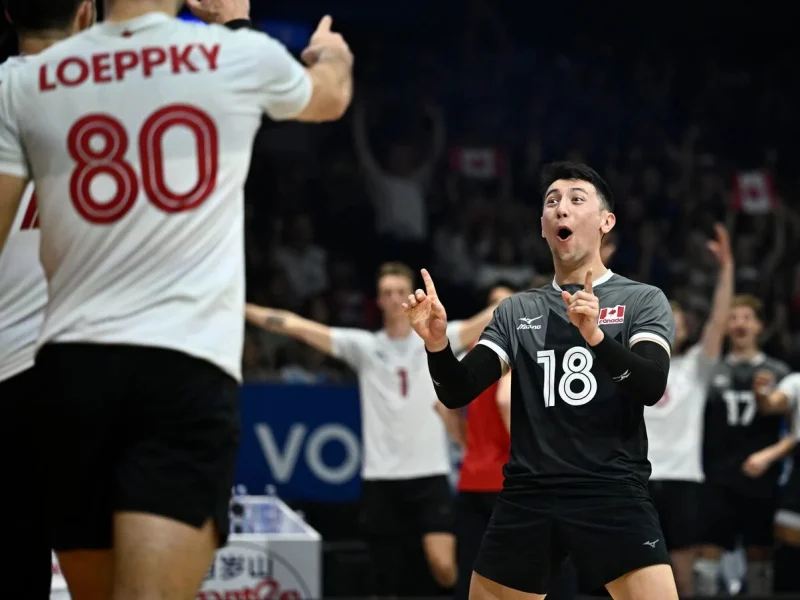 Justin Lui celebrating a point with the Canada men’s national volleyball team