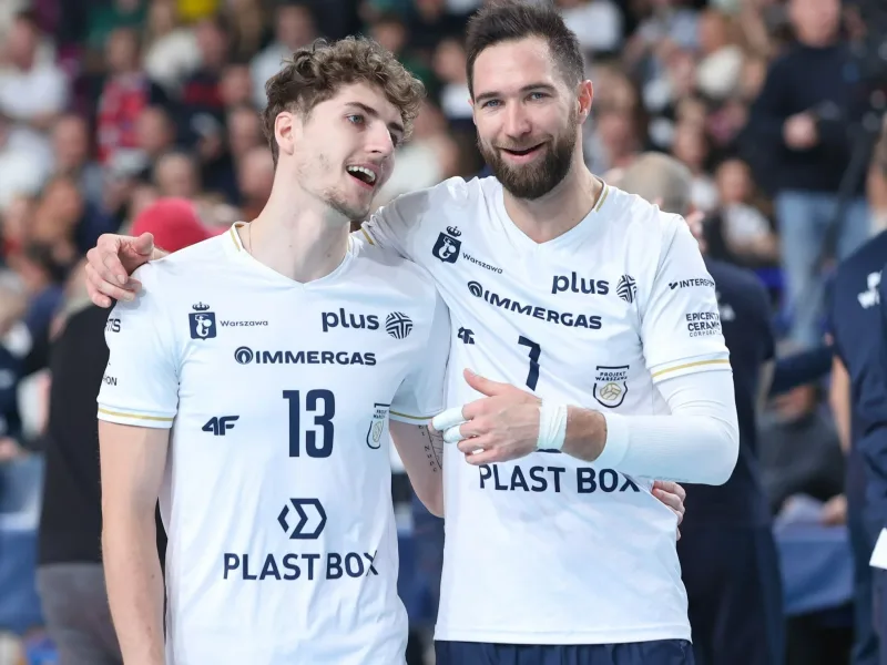 Kévin Tillie stands with a PGE Projekt Warszawa teammate after a match.