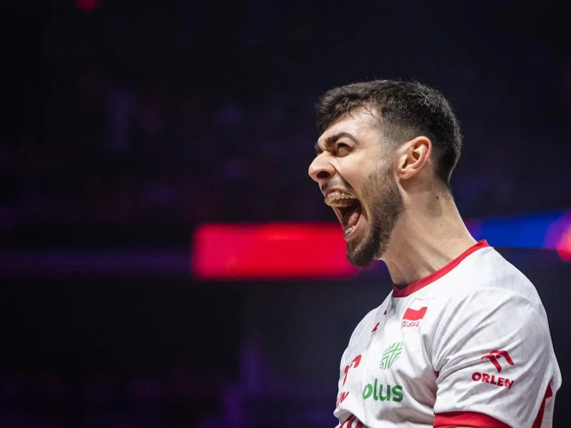 Kewin Sasak celebrates while playing for Poland.