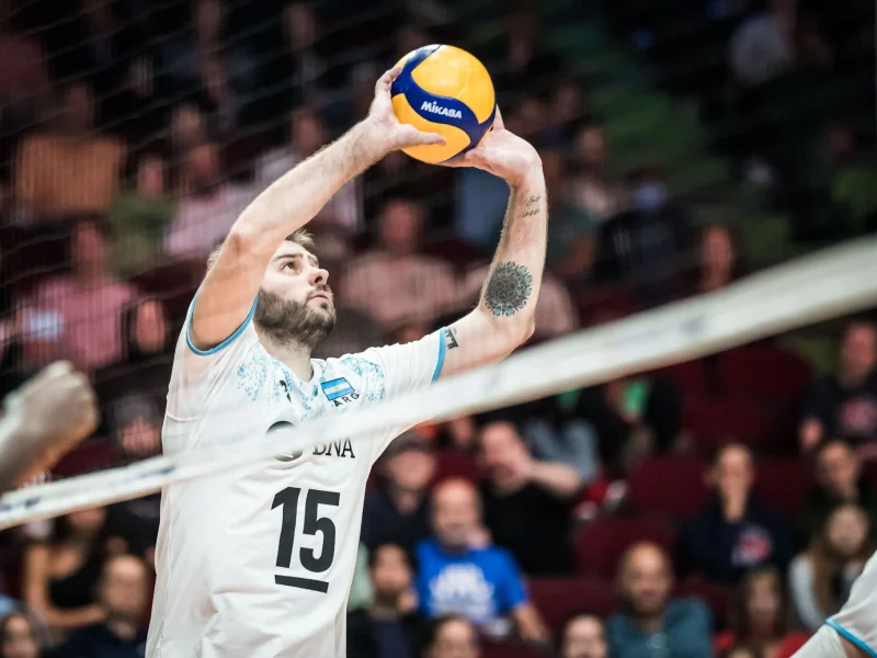 Luciano De Cecco sets the ball for Argentina during international competition.
