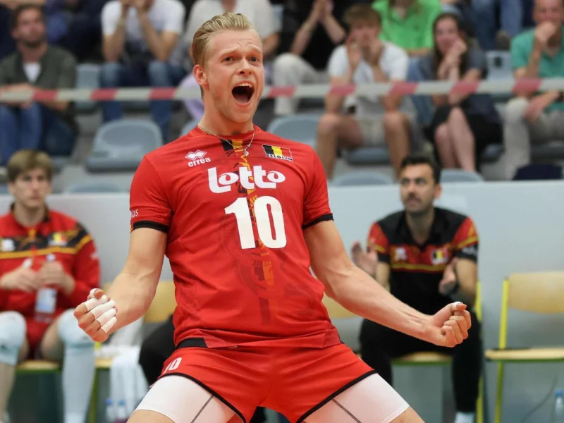 Mathijs Desmet celebrating in Belgium national team kit.
