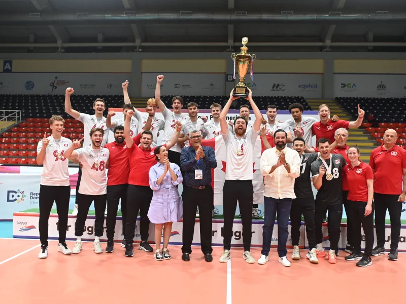 Max Elgert with Canada celebrating the Pan American Cup volleyball title