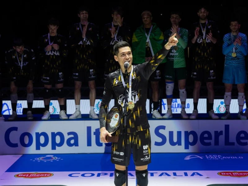 Micah Christenson holding the MVP award after Rana Verona won the 2026 Coppa Italia.