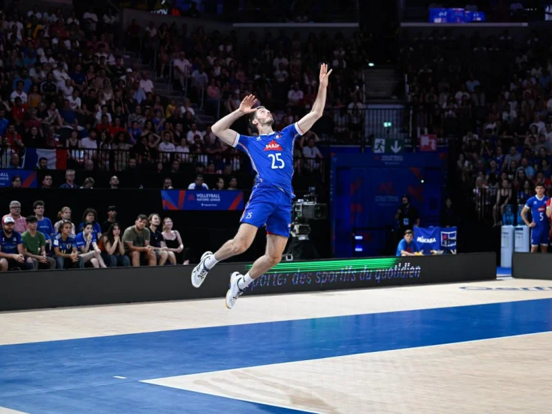 Quentin Jouffroy executing a jump serve for France