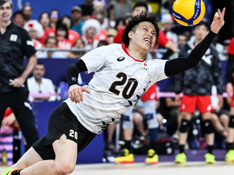 Tomohiro Yamamoto diving for a defensive play with Japan.
