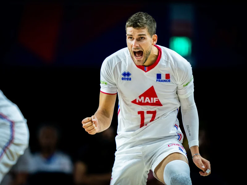 Trévor Clévenot attacks for France during Volleyball Nations League competition.