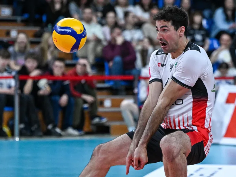 Yacine Louati receives the ball for Asseco Resovia during club volleyball.
